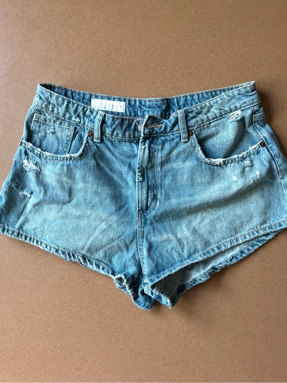 Zara Women's Light Blue High-Waisted Distressed Cut-Off Shorts. Size 12 US